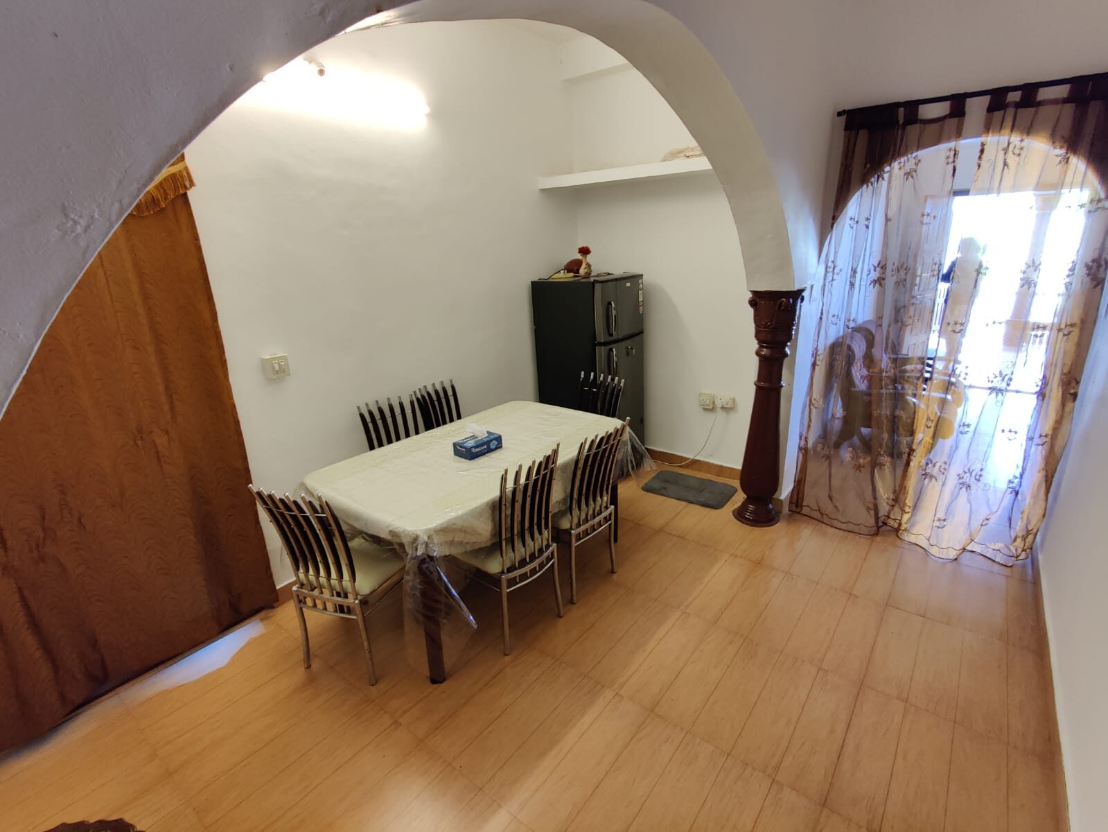 Dining area with a table and chairs